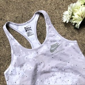 The Nike Tee Sport Cut Racerback Tank Top